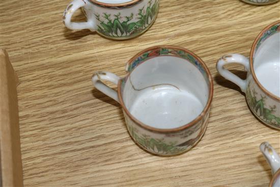 A set of Chinese famille rose cockerel cups, saucers and plates, early 20th century